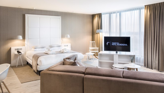 Wellness Suite met kingsiz bed, loungebank en tv